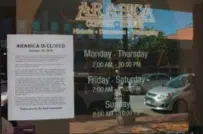  ?? KRISTI GARABRANDT — THE NEWS-HERALD ?? Arabica customers who did not find out on social media learned about the business’s sudden closing on Oct. 16, when they arrived to find a notice taped to the door.