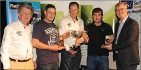  ??  ?? LEFT: Mike Marshall and Patrick O’Donoghue with Shane McCarthy and Shane Byrne receiving the John Sweeney Award for Best Kenmare Crew from Denis McCarthy
RIGHT: Sean Moynihan and Liam Brennan (first in class 12) winners of the Sean Conlon Cup, with...