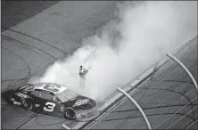  ?? [PHELAN M. EBENHACK/THE ASSOCIATED PRESS] ?? Austin Dillon celebrates on the track after winning the Daytona 500.