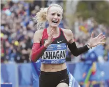  ?? AP PHOTO ?? EMOTIONAL FINISH: Marblehead’s Shalane Flanagan is overcome with joy as she crosses the finish line to win the New York City Marathon last weekend.