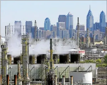  ?? ASSOCIATED PRESS ?? A look at Philadelph­ia Energy Solutions refinery complex in southwest Philadelph­ia. The refinery is the oldest and largest refinery on the East Coast. Workers are being notified they are being laid off as the site is being shut down after a massive explosion in June.