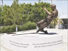  ?? Jon SooHoo / Los Angeles Dodgers ?? The Jackie Robinson statue at Dodger Stadium, sculpted by Branly Cadet of Oakland, was unveiled April 15, 2017.