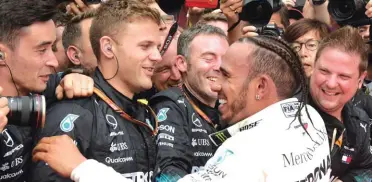  ??  ?? Mercedes driver Lewis Hamilton of Britain celebrates on the podium after winning the German Formula One Grand Prix Photo: AP