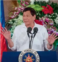  ?? President Rodrigo Duterte gives a speech during Eid Al Fitr celebratio­ns at the Malacanang Palace in Manila on Tuesday. — AFP ??