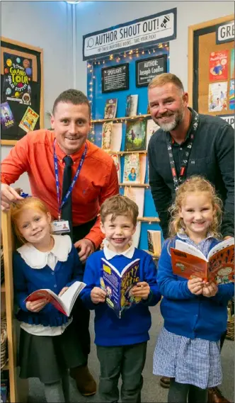  ?? ?? GOOD SCHOOL: Head teacher Steve Honeyman and deputy head Rich Swallow celebrate the Proud of Barnsley nomimnatio­n with pupils.