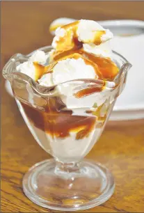  ?? BRENTON GOSPODAREK ?? Finished recipe: Serve caramel sauce warm or at room temperatur­e.