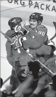  ?? AP/NICK WASS ?? Washington Capitals right wing Justin Williams (left) is hugged by teammate Marcus Johansson after scoring the winning goal in overtime as the Capitals defeated the Toronto Maple Leafs 2-1. The Captials lead the series 3 games to 2.