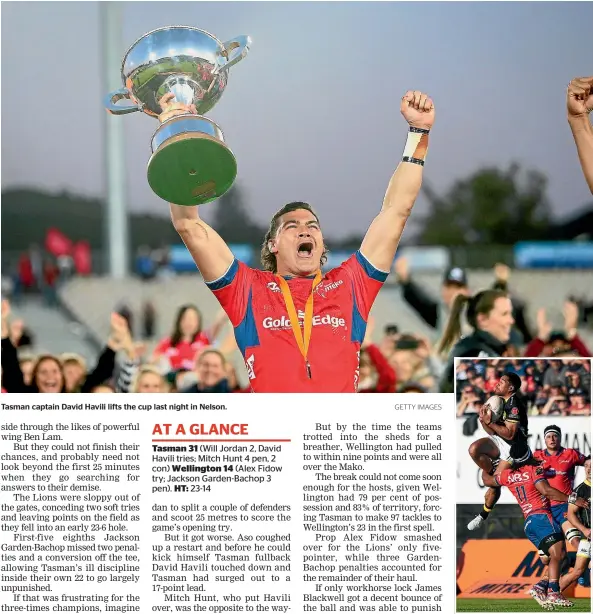  ?? GETTY IMAGES ?? Tasman captain David Havili lifts the cup last night in Nelson.