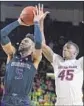  ?? Darryl Webb Associated Press ?? ARIZONA STATE’S Zylan Cheatham closes in on Washington’s Jaylen Nowell.