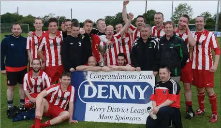  ??  ?? The Mastergeeh­a FC team celebrate winnning the 2014/15 KDL Premier B League title after winning the replayed final in Mounthawk Park