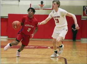  ?? EVAN WHEATON - MEDIANEWS GROUP ?? Neshaminy guard Emeer Coombs (2) moves near the top of the key alongside Boyertown guard Jake Kapp (23) during the District 1Class 6A boys basketball tournament at Bear Gym on Thursday.