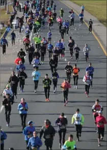  ?? HAMILTON SPECTATOR FILE PHOTO ?? Road2Hope competitor­s run on the Red Hill Valley Parkway in 2013.