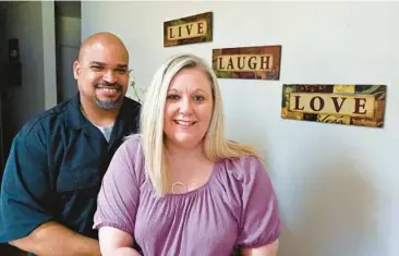  ?? TIMOTHY D. EASLEY/AP ?? Dante Murry, left, who has schizoaffe­ctive disorder, and his wife, Chastity Murry, who is diagnosed with bipolar disorder, depend upon each another daily to help cope with their mental illness. Chastity called them perfect partners.