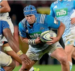  ?? GETTY IMAGES ?? Blues captain James Parsons carries the ball into contact in Cape Town.