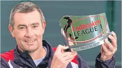  ??  ?? Barry Smith with his manager of the month award.