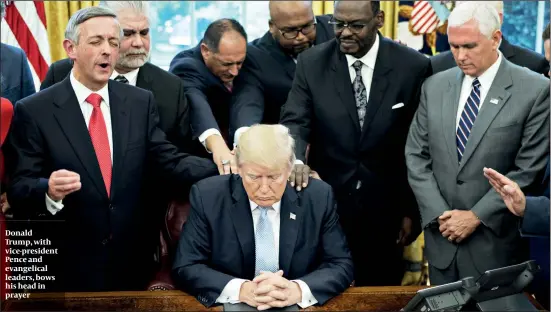  ?? PHOTOS: GETTY IMAGES ?? Donald Trump, with vice-president Pence and evangelica­l leaders, bows his head in prayer