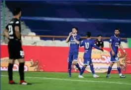  ?? IRNA ?? Hrvoje Milic (2nd L) celebrates with his teammates after scoring Esteghlal’s winner during a 1-0 victory over Mashinsazi at the Azadi Stadium, Tehran, Iran, on November 25, 2020.