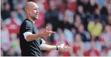  ?? ASSOCIATED PRESS FILE PHOTO ?? Manchester City head coach Pep Guardiola gestures during an English Premier League soccer match against Southampto­non Sunday.