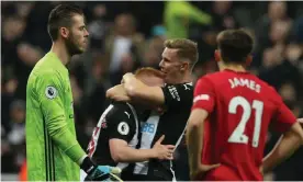  ??  ?? David de Gea and teammate Daniel James look disconsola­te after Matty Longstaff’s winning goal. Photograph: Matthew Peters/Manchester United via Getty Images