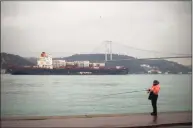  ?? Associated Press ?? Cargo ship Oakland crosses the Bosphorus strait in Istanbul on Tuesday, heading towards the Marmara sea after departing from Russia's Novorossiy­sk port.