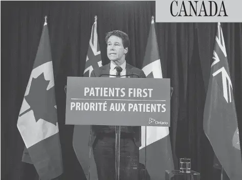  ?? ERNEST DOROSZUK / POSTMEDIA NEWS FILES ?? Ontario Health Minister Eric Hoskins says that forcing drug companies to publicly divulge the payments they make to health-care profession­als will boost transparen­cy in the system. Studies have suggested that such financial links can negatively affect...