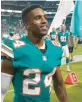  ?? WILFREDO LEE/AP ?? Dolphins cornerback Byron Jones walks off the field after a game against the Patriots on Jan. 9 n Miami Gardens, Fla.