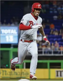  ?? THE ASSOCIATED PRESS ?? Phillies’ Nick Williams heads to third base for a triple during the seventh inning of Wednesday’s win over the Marlins.