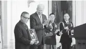  ?? EVAN VUCCI AP ?? John Kaneshiro accepts the Medal of Honor on behalf of his late father, Staff Sgt. Edward Kaneshiro.