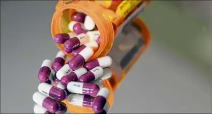  ?? Elise Amendola / Associated Press ?? The Federal Trade Commission has started an inquiry into the operations of pharmacy benefit managers who control access to prescripti­on drugs for millions of Americans.