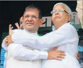  ?? AP DUBE/HT PHOTO/PTI ?? (Clockwise from top) RJD chief Lalu Prasad with Sharad Yadav at the rally at Gandhi Maidan in Patna on Sunday; former state health minister Tej Pratap plays a conch; former Uttar Pradesh chief minister Akhilesh Yadav gestures during the rally.