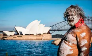  ?? XINHUA PHOTO ?? ‘INVASION DAY’
This file photo shows an aboriginal man at the Sydney harbor, Australia on Nov. 11, 2020. Tens of thousands of Australian­s took to the streets on Friday, Jan. 26, 2024, protesting a contentiou­s national holiday that also marks the arrival of European colonists more than 200 years ago.