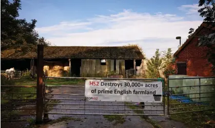  ?? Christophe­r Thomond/The Guardian ?? A farm in Cheshire in the path of the proposed HS2 rail line from Crewe into Manchester that now looks to be in doubt. Photograph: