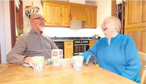  ?? Picture: Kris Miller. ?? “Above all, give them your time”: Derek and Joyce enjoy a chat over a cuppa.