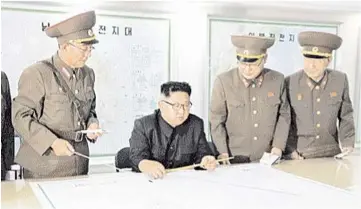  ??  ?? Kim visits the Command of the Strategic Force of the Korean People’s Army (KPA) in an unknown location in North Korea in this undated photo released by North Korea’s Korean Central News Agency (KCNA). — Reuters photo