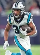  ?? MATT PATTERSON/AP ?? Panthers running back Chuba Hubbard carries against the Texans on Thursday in Houston.