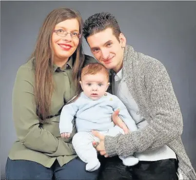  ??  ?? WORRIED: Kirsty and Chris Humphrey with baby Oakley – the couple say they found insects in SMA milk formula and are worried contaminat­ed batches could be given to newborns