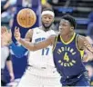  ?? MICHAEL CONROY/ASSOCIATED PRESS ?? Victor Oladipo and Indiana sent the Magic and Jonathon Simmons to a ninth consecutiv­e loss.