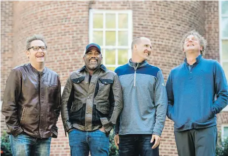  ??  ?? From left, Dean Felber, Darius Rucker, Jim Sonefeld and Mark Bryan of Hootie &amp; the Blowfish, who are returning with a tour and album 25 years after Cracked Rear View launched the South Carolina-based rock band.