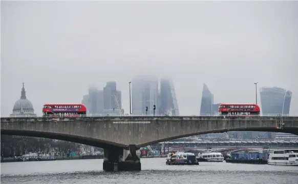  ?? Reuters ?? Waterloo Bridge in London. UK chancellor Rishi Sunak said November’s GDP contractio­n indicates ‘things will get harder before they get better’