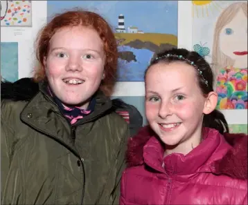  ??  ?? Aoife Washington and Meg Lowney at the the opening of the Lions Club art exhibition on Saturday afternoon in Wexford Arts Centre.