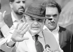  ??  ?? Shahbaz Sharif gestures after appearing before a Joint Investigat­ion Team (JIT) in Islamabad in this file picture. — Reuters photo