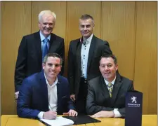  ??  ?? Colin Sheridan, Sales and Marketing Director, Gowan Distributo­rs Limited; Mark Walsh, Sales Director, Kevin Egan Cars. Front row: Kevin Egan, Dealer Principal, Kevin Egan Cars; Des Cannon, Managing Director at Gowan Distributo­rs Limited, Peugeot...