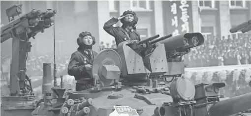  ?? WONG MAYE- E, AP ?? Soldiers in tanks are paraded on the Kim Il Sung Square during a military parade Saturday in Pyongyang, North Korea, to celebrate the 105th anniversar­y of the birth of Kim Il Sung, the country's founder and grandfathe­r of current ruler Kim Jong Un.