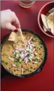  ?? LUCY BENI VIA ASSOCIATED PRESS ?? This November 2017 photo shows hot corn queso dip in New York. This dish is from a recipe by Katie Workman.