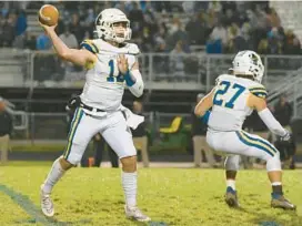  ?? SUN MEDIA BRIAN KRISTA/BALTIMORE ?? Liberty’s Jack Pellicciot­ti, throwing to a receiver during a game at Westminste­r on Oct. 21, recently announced his commitment to play at Towson University.