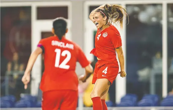  ?? CANADA SOCCER ?? Canadian defender Shelina Zadorsky jumps for joy after scoring against Mexico on Tuesday. Canada won 2-0 to set up a semifinal showdown with Costa Rica.