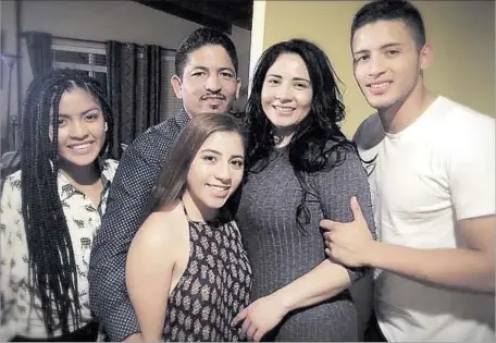  ?? Hayne Palmour ?? OCEANSIDE music minister Jorge Ramirez, second from left, with his daughters, Betsabe and Abisag Ramirez, his wife, Silvia Ramirez, and his son, Caleb Ramirez. Ramirez, a Trump supporter who entered the U.S. illegally at 11, was detained by Border...