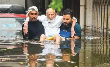  ?? PTI ?? An elderly person being rescued from a flood-affected colony at Rajendra Nagar in Patna yesterday. In Bihar, the death toll from the latest bout of rain had reached 20 yesterday.
