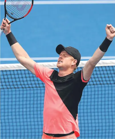  ?? Picture: Getty. ?? Britain’s Kyle Edmund celebrates the biggest victory of his career, progressin­g to the second round of the Australian Open at the expense of big-hitting South African Kevin Anderson.