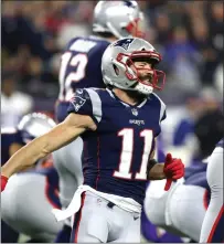  ?? File photo by Louriann Mardo-Zayat / lmzartwork­s.com ?? Wide receiver Julian Edelman and the Patriots can win their 10th straight AFC East title with a victory today against the Bills or a Dolphins defeat to Jacksonvil­le.